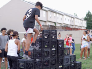 A Picture of a Man playing The Milk Crate Challenge