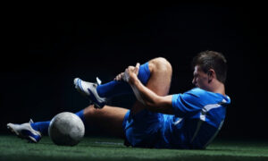 A picture of A player suffering a shin fracture