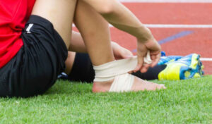 A picture of a player suffering an ankle sprain